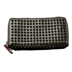 Christian Louboutin Studded Black Panettone Wallet with red interior.